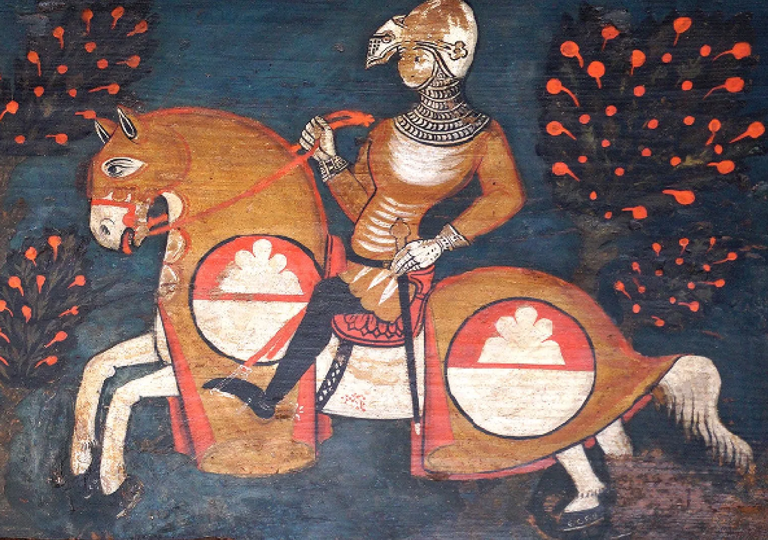 Cavaliere in armatura su un cavallo bardato con gli scudi dei Chiaramonte, tra alberi dai frutti rossi